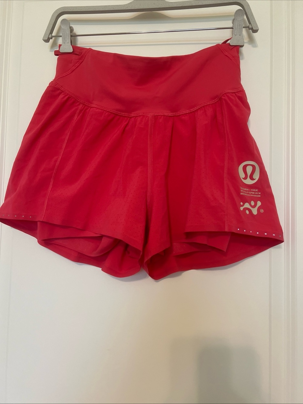 lululemon perforated pink large logo Athletic Shorts Built-In Liner sz.6 GREAT